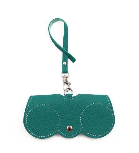 A teal silicone pouch designed for portable eyewear storage.