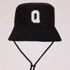 Black sun hat with a white letter O print and an adjustable cord