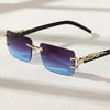 A pair of trendy frameless rectangular sunglasses with purple-blue lenses and gold accents.