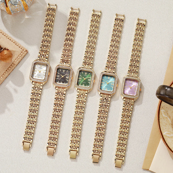 Five gold-toned quartz wristwatches with various colored rhinestone accents displayed on a light background.