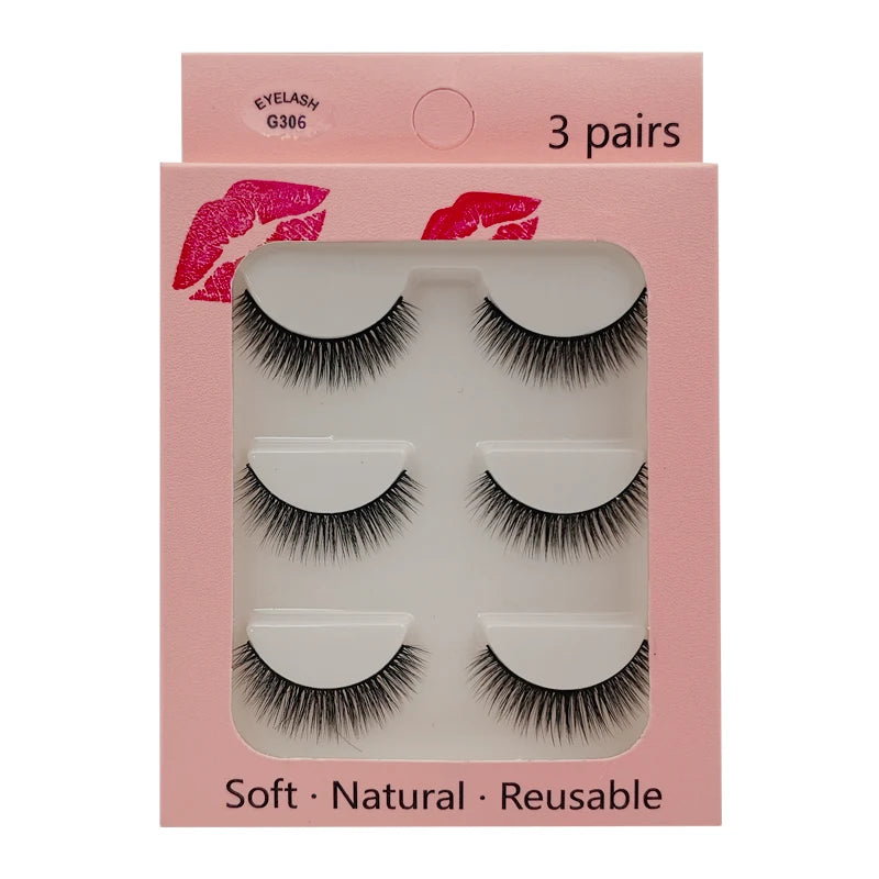 A box of 3 pairs of soft natural reusable mink strip eyelashes with a pink background.