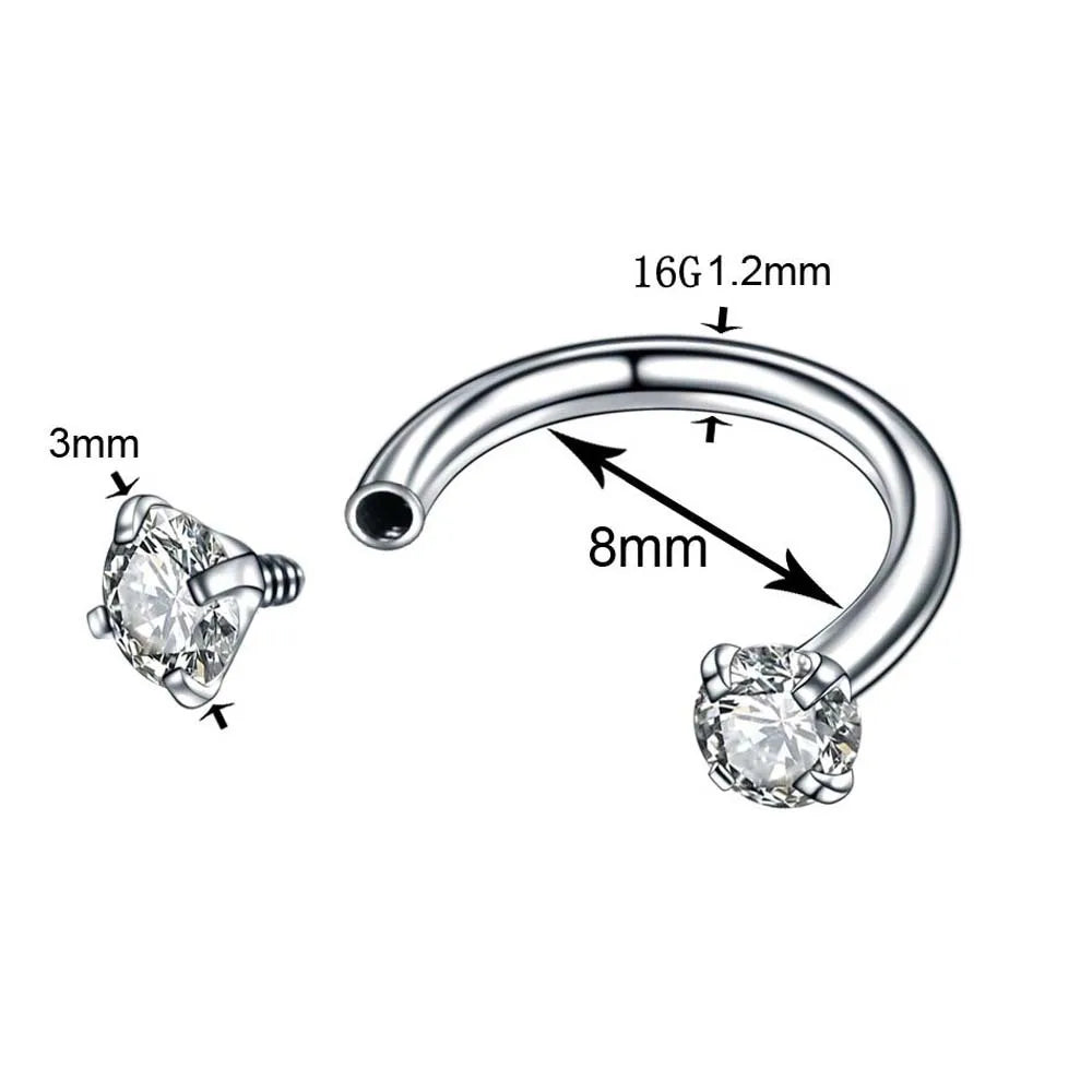 A pair of stainless steel crystal hoop ear piercings with 16G gauge and 1.2mm size.