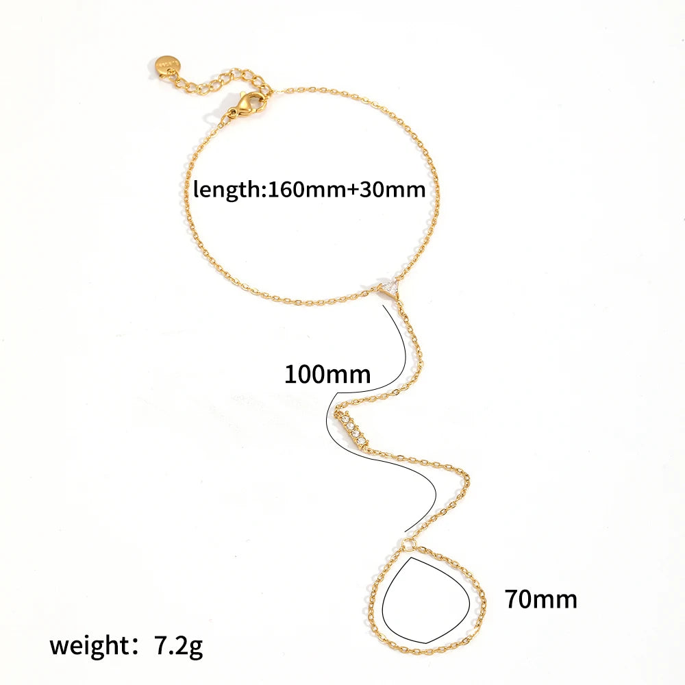 A delicate 18K gold plated stainless steel bracelet featuring zircon stones, shown against a white background.