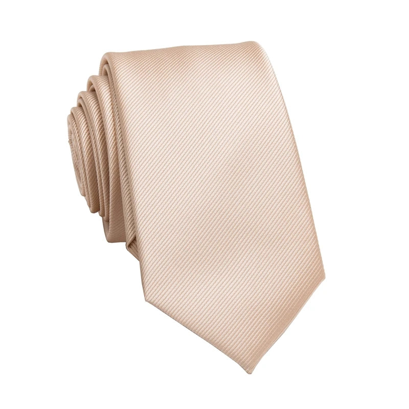 A beige striped business tie folded neatly.