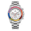 A silver watch with a white dial, red and pink accents, and diamond-studded bezel and bracelet.