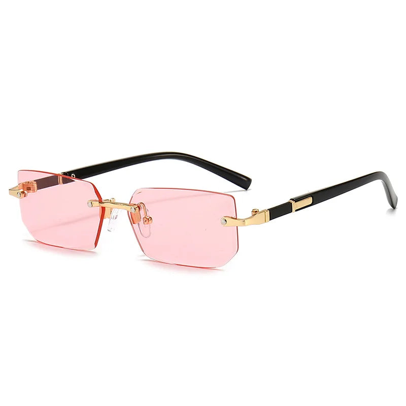 Rimless pink sunglasses with black frames and gold accents