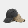 A pair of vintage solid color dad hats, one dark gray and one tan, shown against a light background.