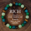 A circular bracelet made of various green and brown malachite beads.