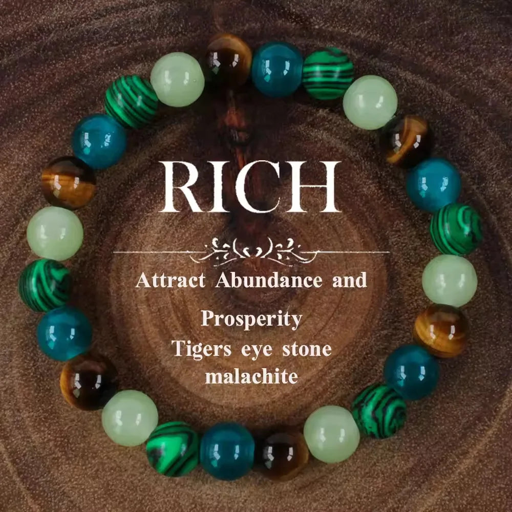 A circular bracelet made of various green and brown malachite beads.