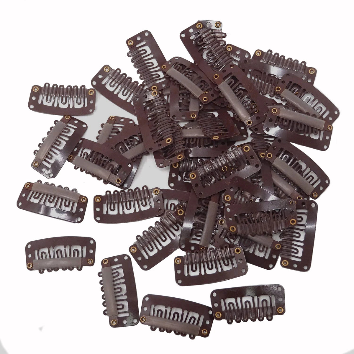 A collection of dark brown precision snap hair extensions for bangs.