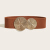 A wide, solid brown elastic waist belt featuring two circular, textured gold-toned embellishments.