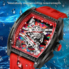 A red and black waterproof watch with a visible mechanical movement is shown against a blue, watery background.
