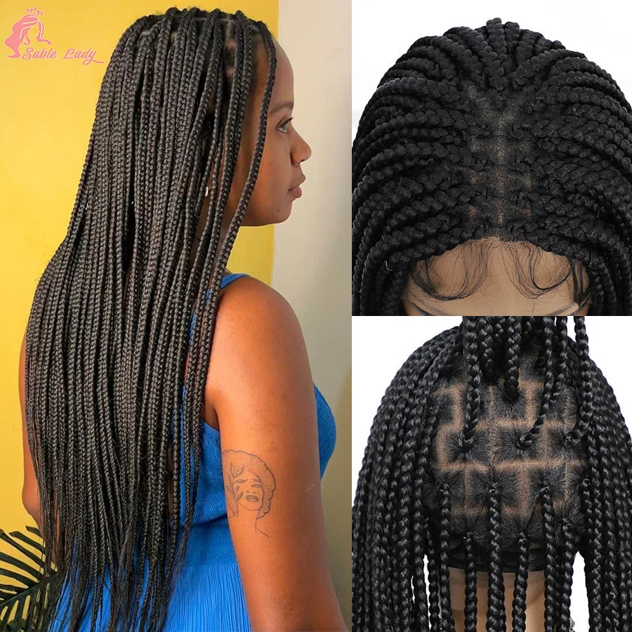 A woman shows off a long black box braid wig with full lace detailing.