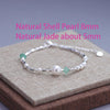 Sterling silver double heart charm bracelet featuring natural shell pearl and jade beads