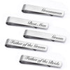 A set of four brushed stainless steel men's tie clips for groomsmen, best man, groom, and father of the bride.