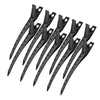 A set of black professional fixed hair pins for styling.