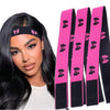 A woman models pink and black elastic bands for wig edges on her hair.
