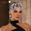 A model wears a sparkling rhinestone bridal hair hoop crown and a black silk neck scarf.