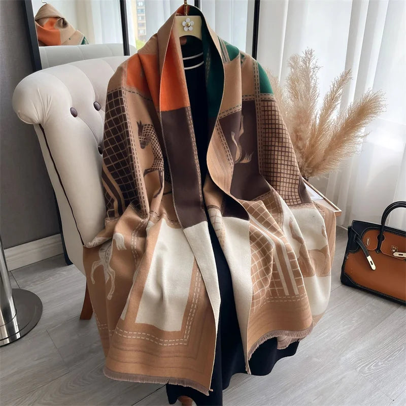 A luxury plaid cashmere feel scarf and shawl wrap draped over a dark garment.