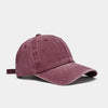 A maroon washed cotton snapback cap shown from the side.