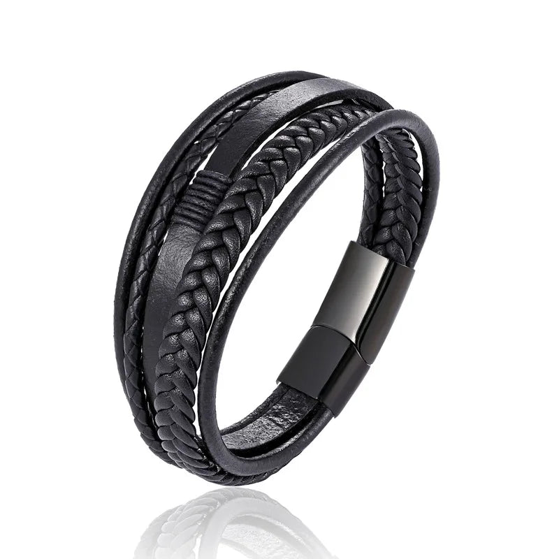 Black braided leather bracelet with a silver clasp and a compass design.