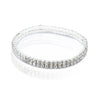 A stack of multi-layer crystal tennis anklets for women, featuring sparkling clear stones.