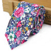 Nœud de coton élégant à motifs floraux roulés, rose, bleu et vert.