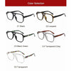 Selección de cinco pares de gafas de lectura estilo piloto vintage en varios colores, incluyendo negro leopardo, verde negro,