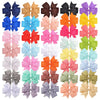 Assorted grosgrain ribbon hair bow clips in various colors and patterns for girls