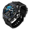 A black multi-function digital wristwatch with a round display showing time, date, and day, set against a dark background.