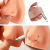 Stainless steel horseshoe nose studs with ball grabbers shown on a model's nose.