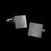 A pair of men's classic copper square cufflinks with a textured, geometric pattern.