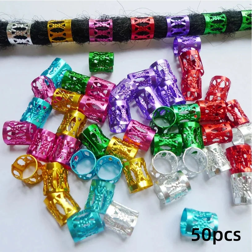 A collection of colorful metal hair rings and clips in various shades including pink, purple, green, and red.