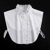 White blouse with a false collar and decorative stitching detail
