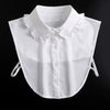 White blouse with a ruffled false collar and detachable neckline