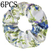 Seis gomas de pelo con estampado floral de satén en tonos blancos y azules