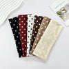 A collection of nine Y2K retro boho wind dot stretch hairbands in various earthy and dark colors laid out on a white surface.