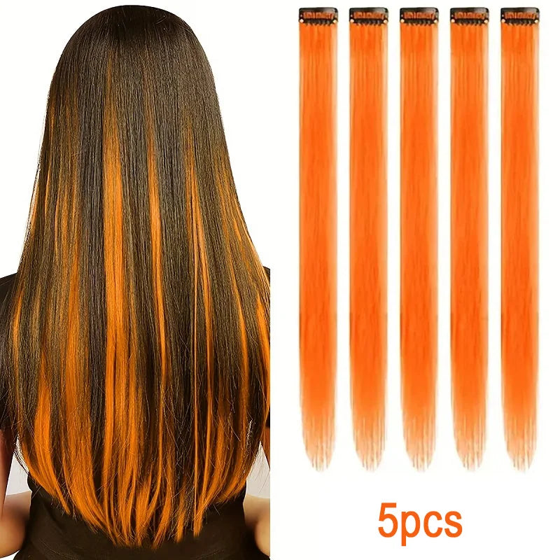 Un set de cinco extensiones de cabello rectas de 20 pulgadas en color degradado naranja y negro vibrante.