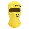 Una máscara balaclava amarilla brillante con texto negro que dice 'Shisty' y un diseño de cara amenazador.