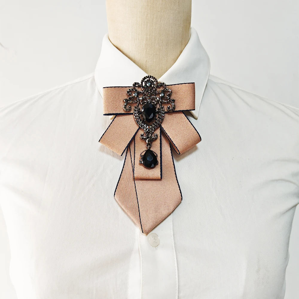 Elegant handcrafted solid color tie with diamond embellishments worn on a white shirt