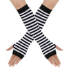Black and white striped knitted fingerless gloves crossed on a hand