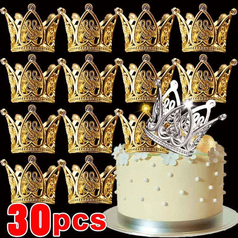 A display of gold and silver mini crown cake toppers arranged on a round cake base.