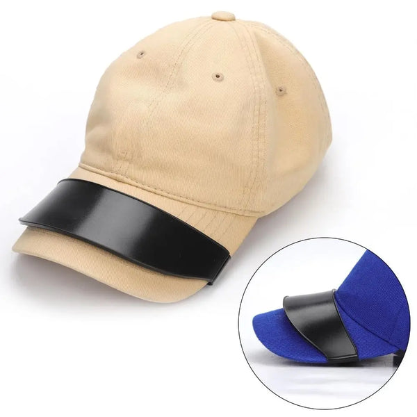 A beige reusable hat brim bender with a black strap shown next to a blue hat.