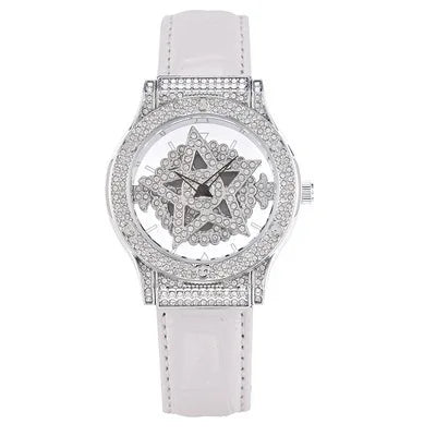 A white leather strap watch with a diamond-encrusted bezel and a geometric face design.