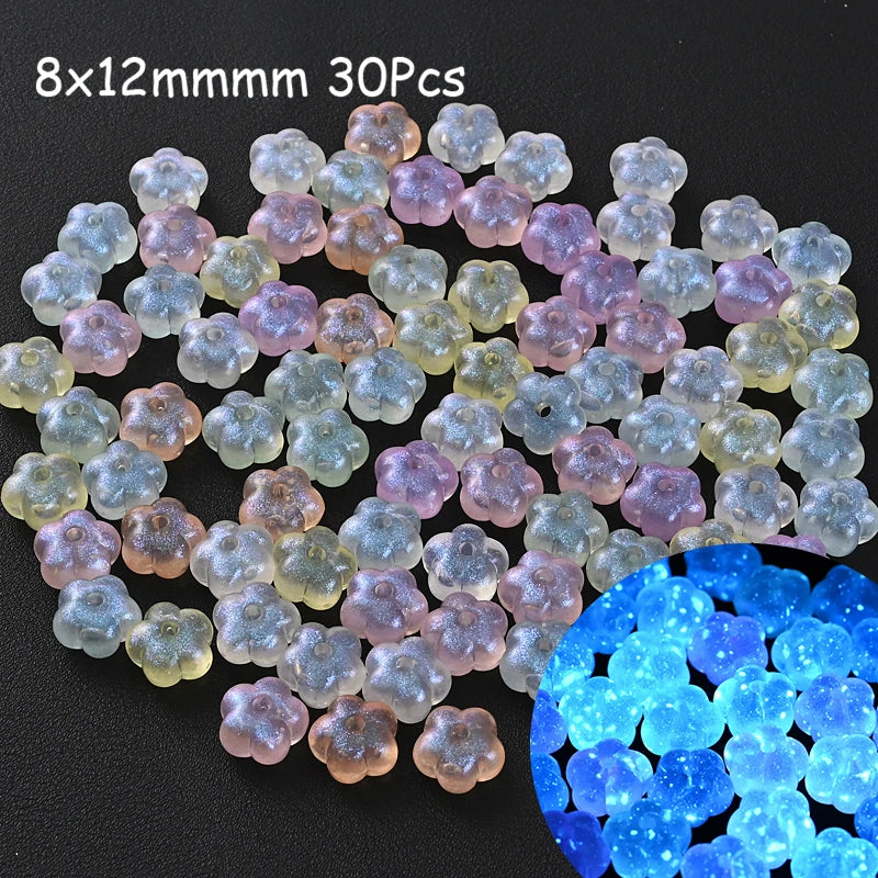 A collection of 30 translucent glow-in-the-dark acrylic beads in various shades of purple and blue.