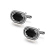 A pair of elegant silver cufflinks with black onyx and silver detailing.
