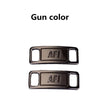 Two metallic gun color AF1 shoe charms or laces.