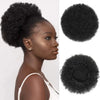 A woman shows off a natural black kinky drawstring ponytail extension in various styles and textures.