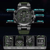 A dark green and black digital watch with a stainless steel band and various function indicators.