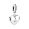 A silver heart pendant featuring a family tree design and surrounded by small diamonds.
